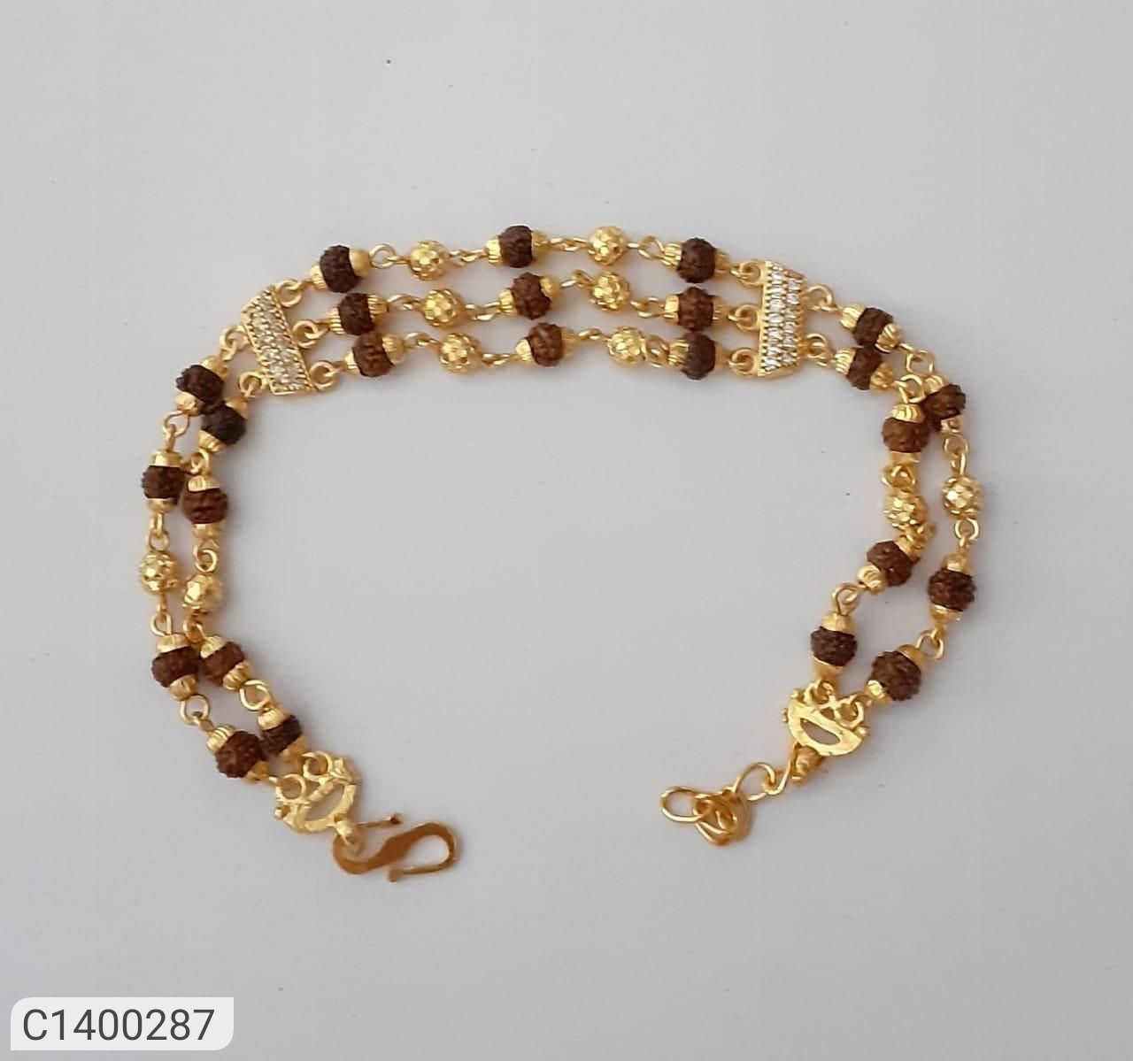 5 Mukhi Rudraksha Bracelet in gold plated caps with OM Pendant – Rudra and  Sons